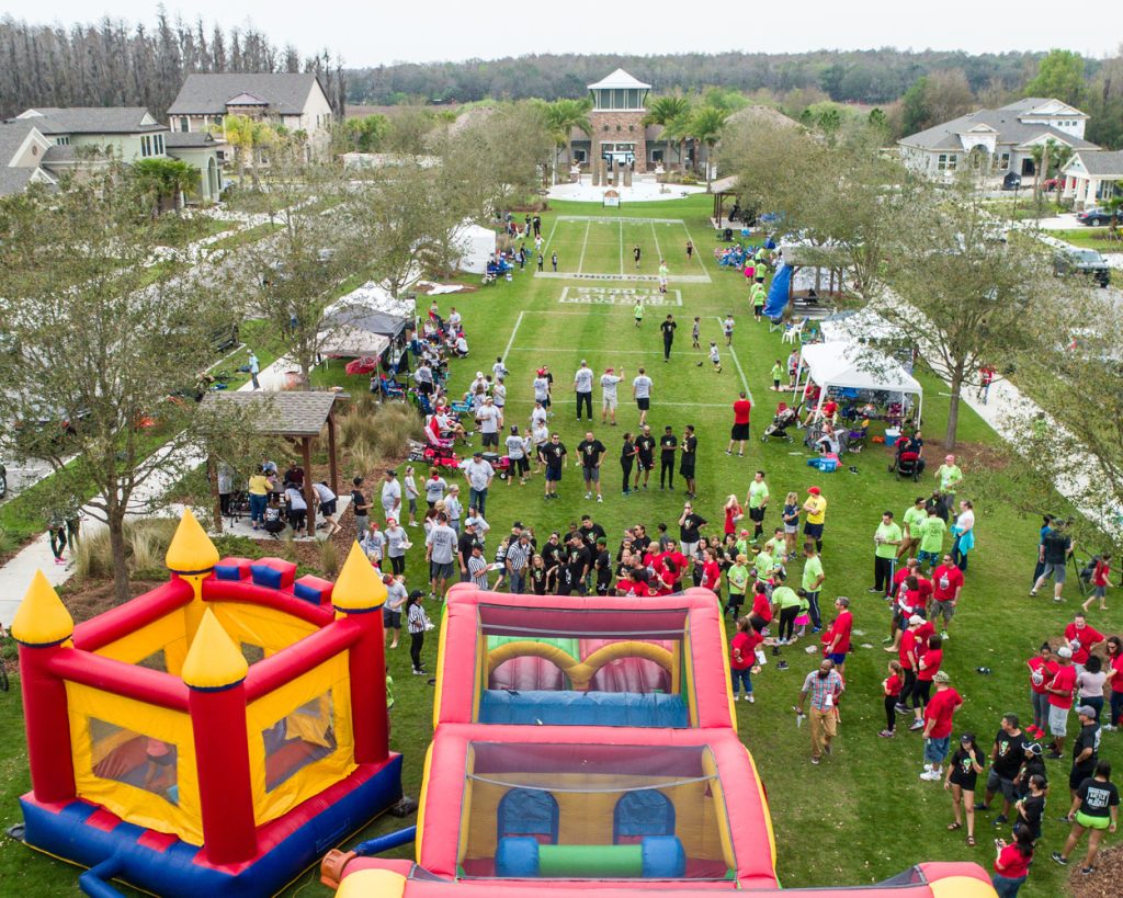 Union Park community event with bouncy houses